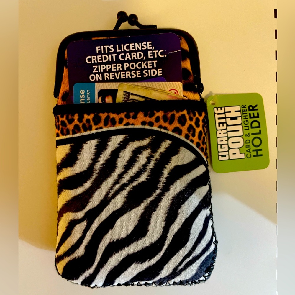 Cigarette case/holder with side zeppelin pocket and credit card slot